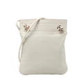 Hermès Aline Mini leather crossbody bag with slim shoulder strap, softly structured pouch shape and silver-tone hardware on a white background.