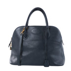 Hermès Bolide 35 dark Blue Indigo textured leather handbag with rounded top handles, gold-tone hardware, padlock and shoulder strap.