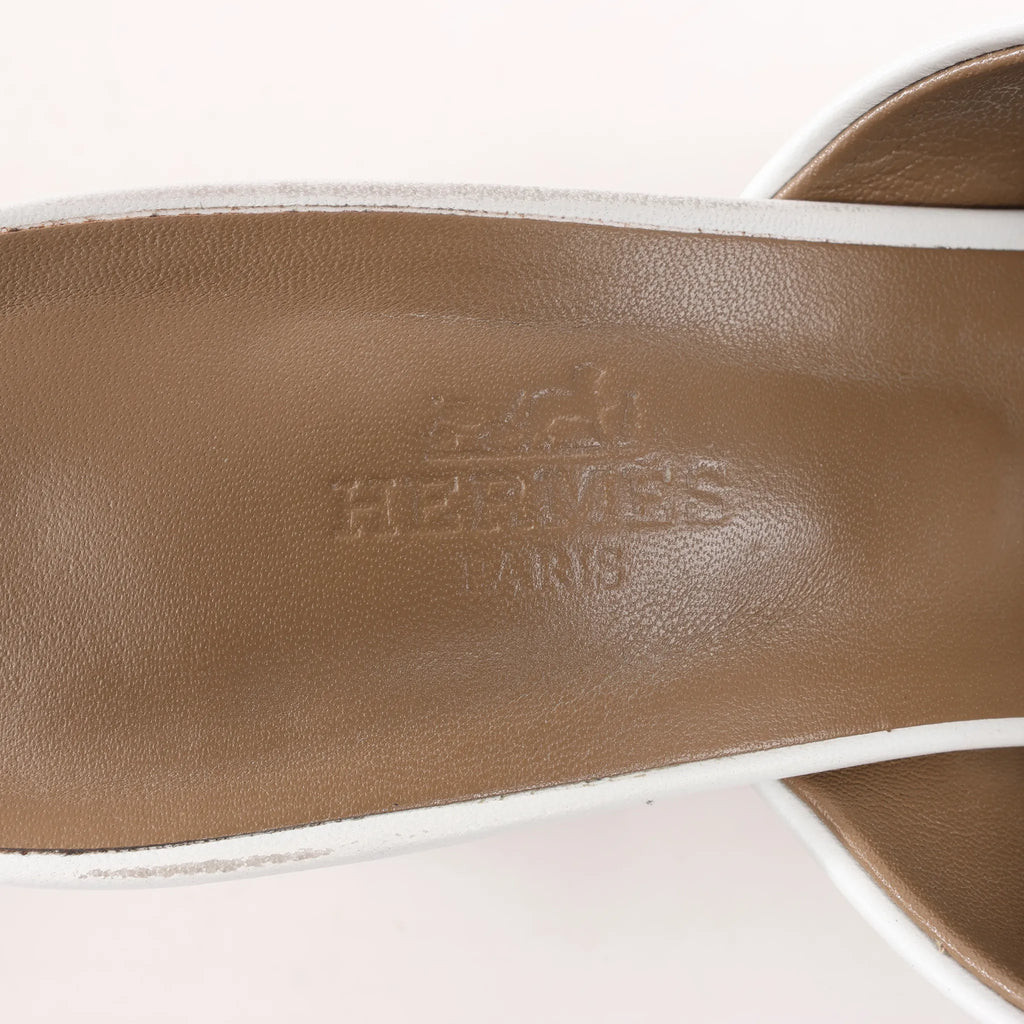 Hermès Camilla Leather Louris Buckle Mule Sandals in White, Size 37.5 EU