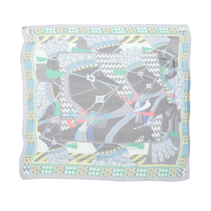 Hermès Carré 140 "Chevaux de Karnak" silk handkerchief in gray featuring abstract horse illustrations with colorful geometric patterns and a decorative border.