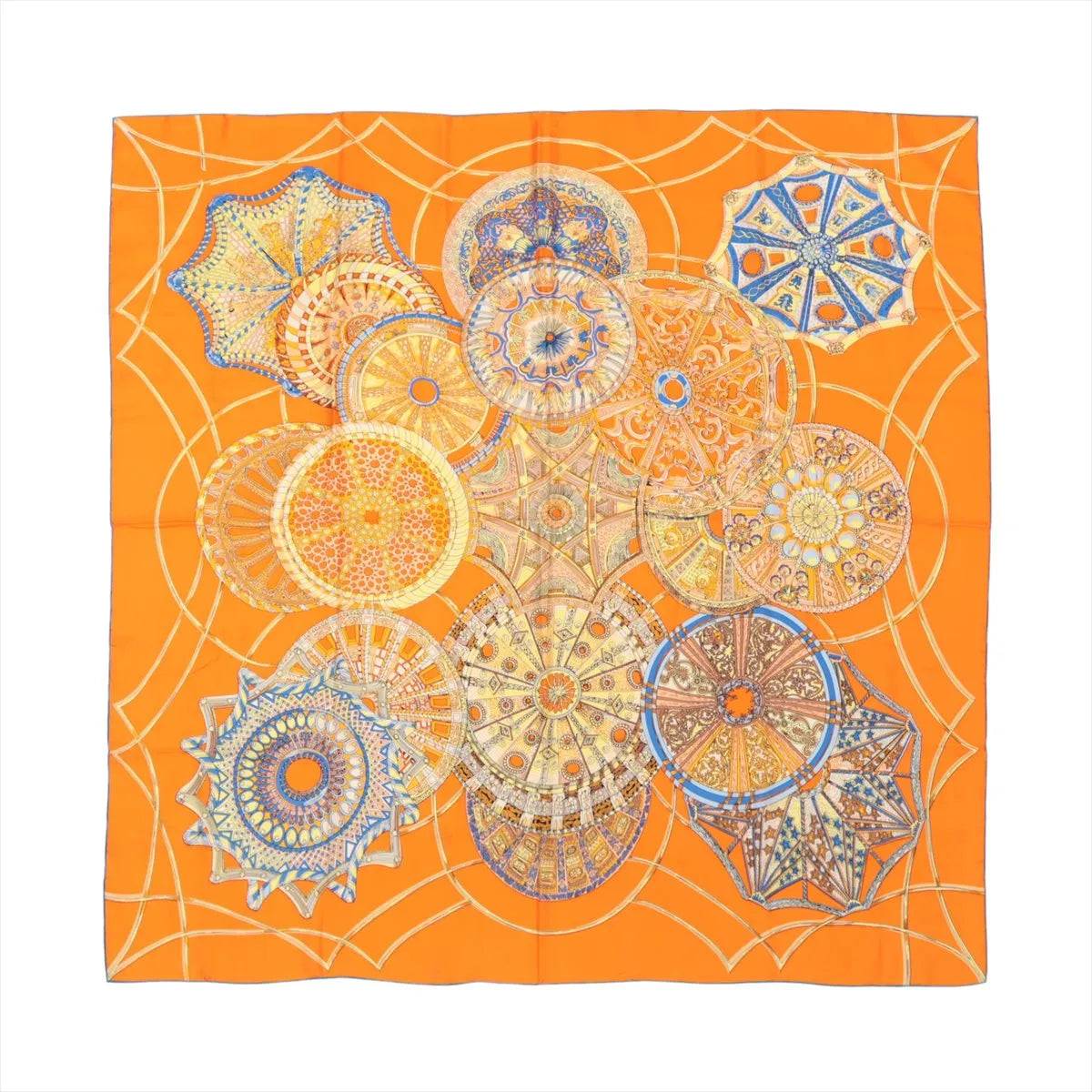 Hermès Carré 90 "LES DÔMES CÉLESTES" silk scarf in bright orange featuring detailed circular dome illustrations in blue, gold, and earth tones, arranged in a celestial-inspired layout.