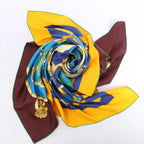 Hermès Carré 140 "Eperon d'Or" Silk handkerchief in Blue x Brown