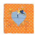 Hermès Carré 70 orange silk scarf with white heart pattern, blue heart center, and illustration of two figures riding a horse with tea cup details.