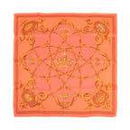 Hermès Carré 70 orange silk scarf with gold crown motif, ornate scrollwork border, and “Hermès Paris” text at bottom on white background