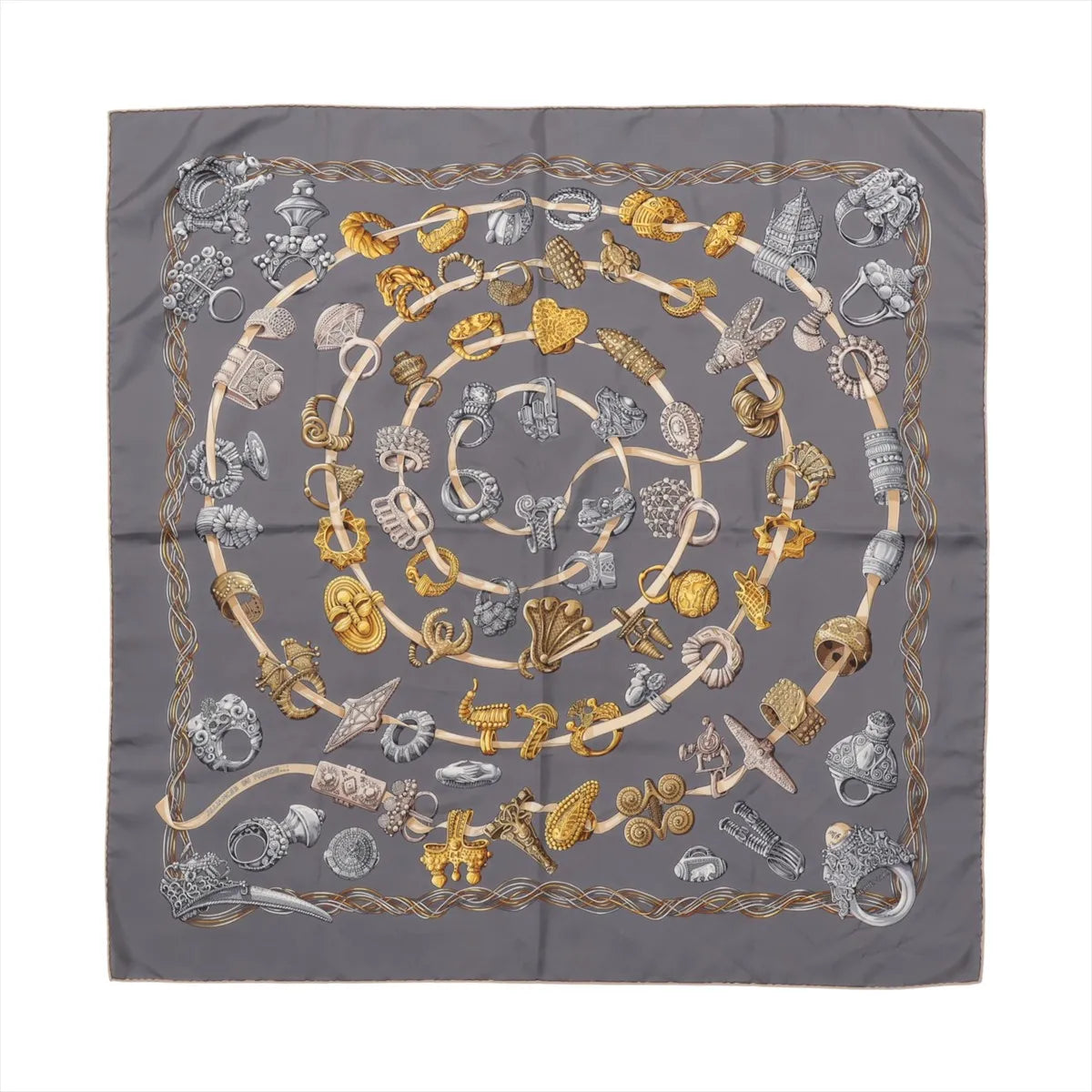 Hermès Carré 90 "Alliances du Monde" silk scarf in gray featuring a spiral pattern of detailed gold and silver rings, symbolizing global unity and cultural heritage, framed by an elegant rope border.
