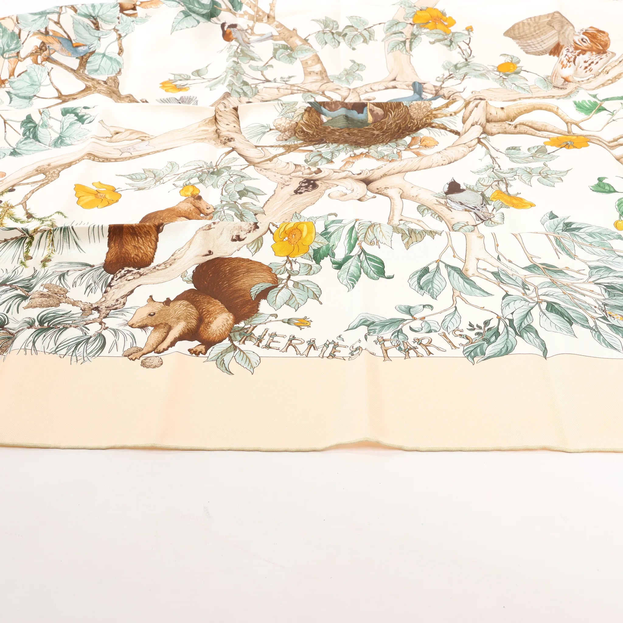 Hermès Carré 90 "AU COEUR DES BOIS" Silk handkerchief in Beige