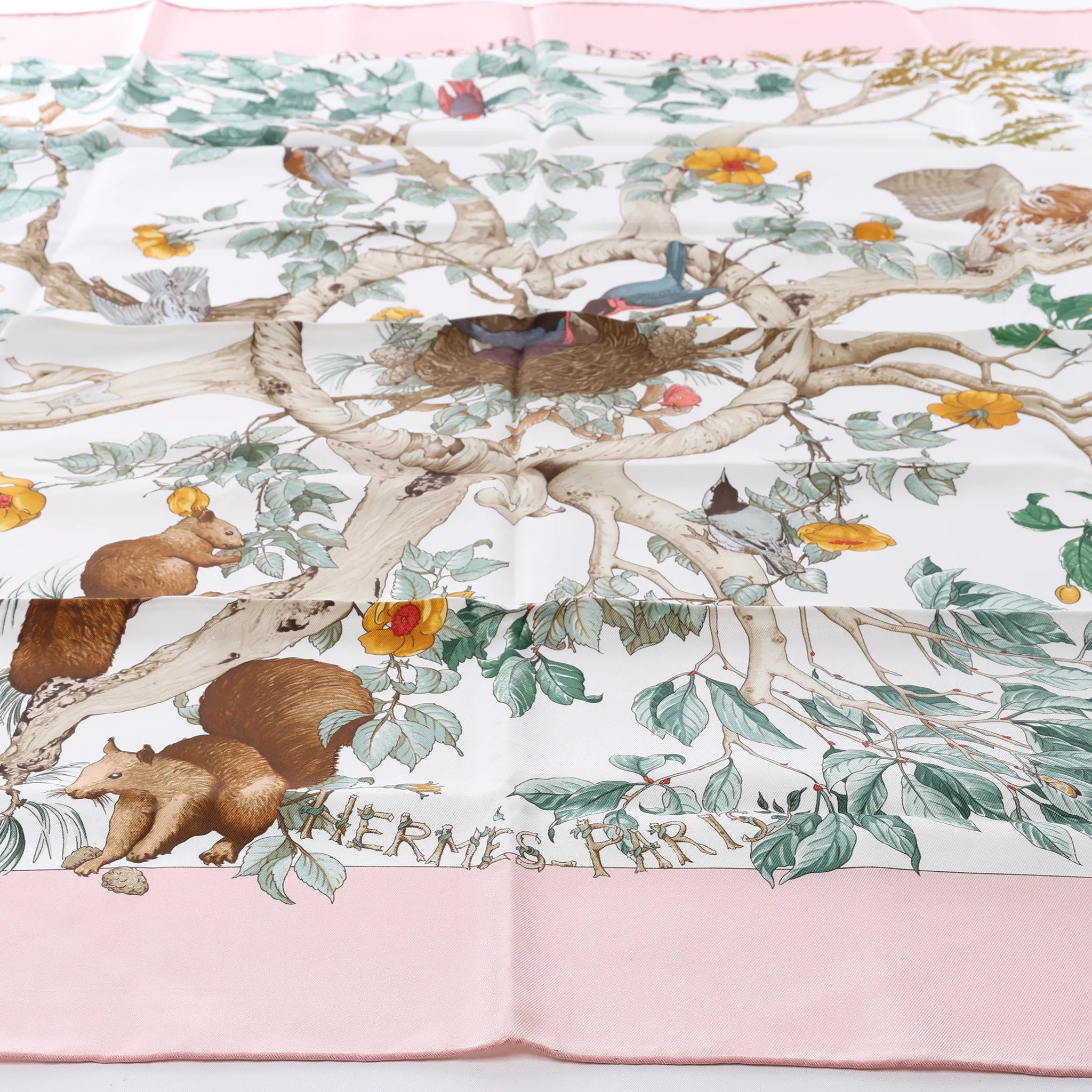 Hermès Carré 90 "AU COEUR DES BOIS" Silk handkerchief in Pink