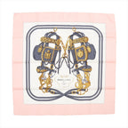 Hermès Carré 90 “Brides de Gala” silk scarf in pink with equestrian-inspired print in gold and gray on white background, bordered in soft pink.