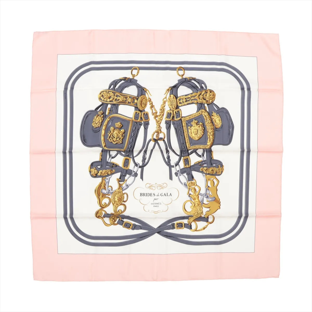 Hermès Carré 90 “Brides de Gala” silk scarf in pink with equestrian-inspired print in gold and gray on white background, bordered in soft pink.