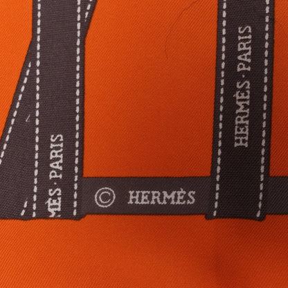 Hermès Carré 90 "Bolduc Ribbon" Silk handkerchief in Orange