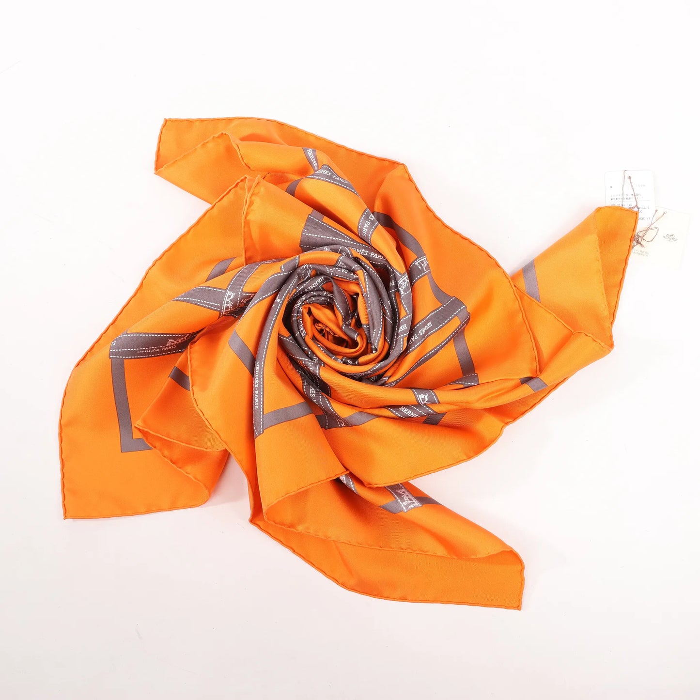 Hermès Carré 90 "Bolduc Ribbon" Silk handkerchief in Orange