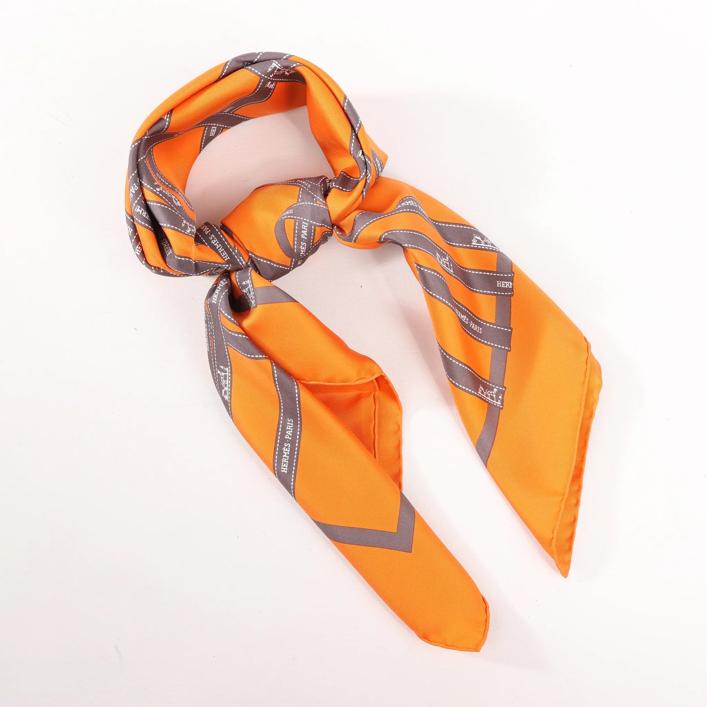 Hermès Carré 90 "Bolduc Ribbon" Silk handkerchief in Orange
