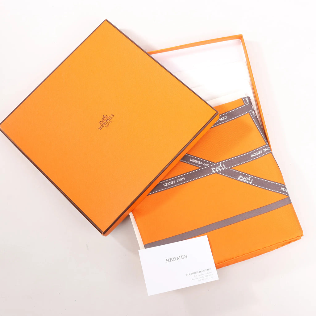 Hermès Carré 90 "Bolduc Ribbon" Pañuelo de seda en naranja