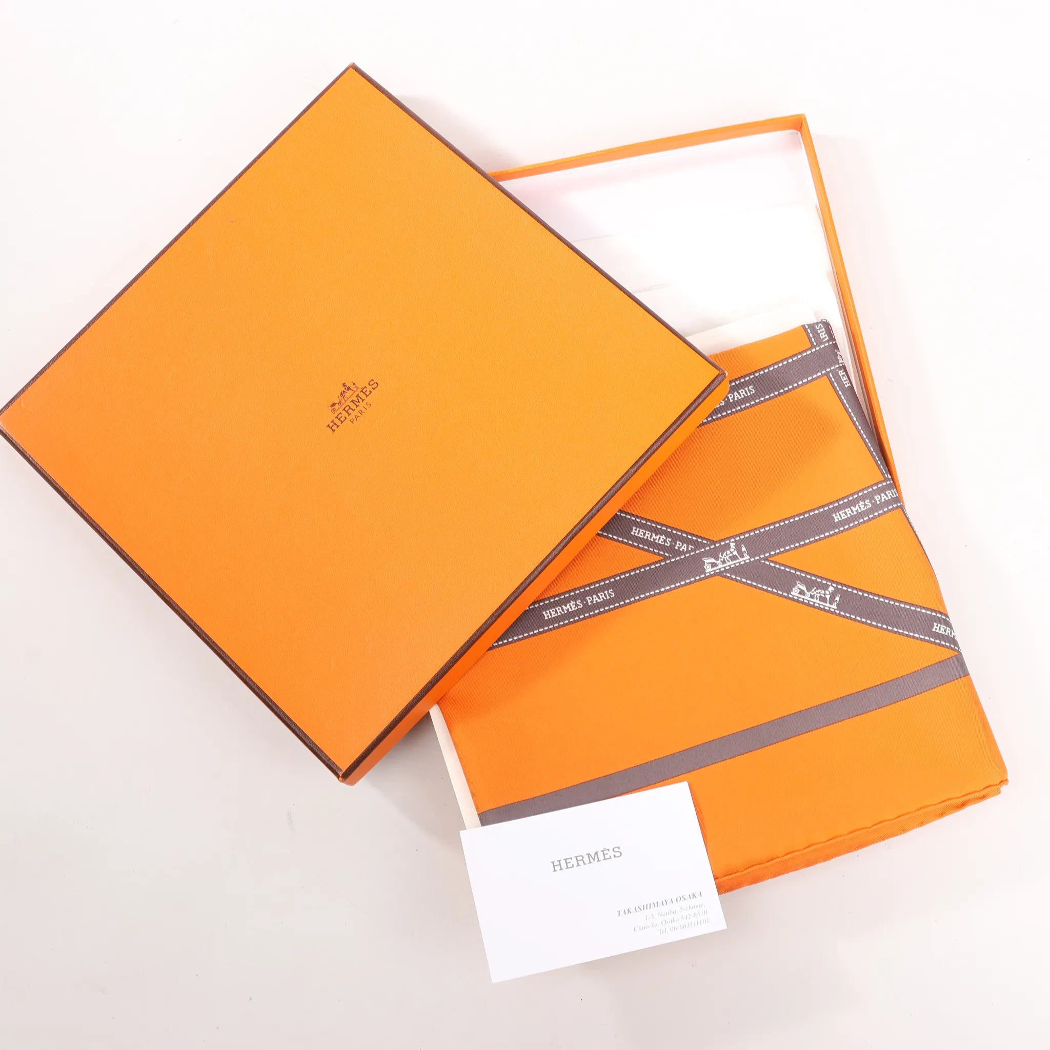 Hermès Carré 90 "Bolduc Ribbon" Pañuelo de seda en naranja
