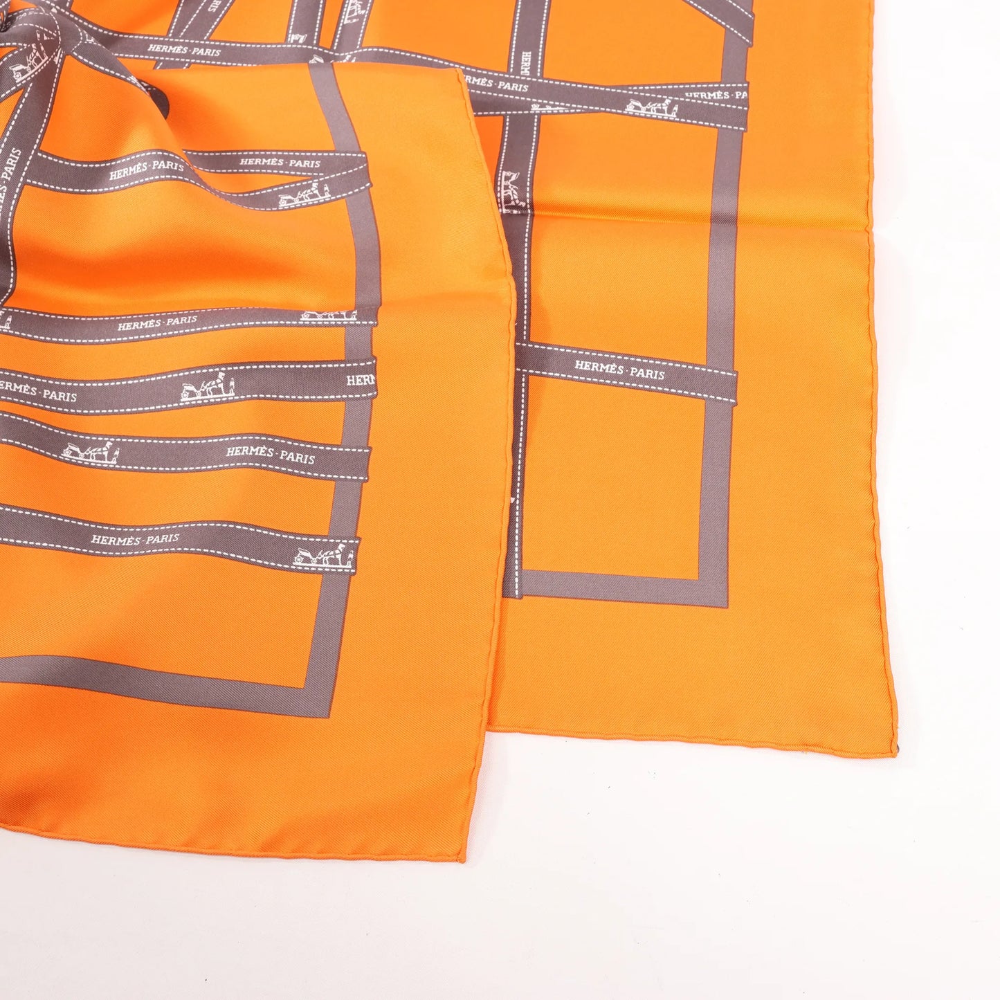 Hermès Carré 90 "Bolduc Ribbon" Silk handkerchief in Orange
