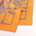 Hermès Carré 90 "Bolduc Ribbon" Pañuelo de seda en naranja