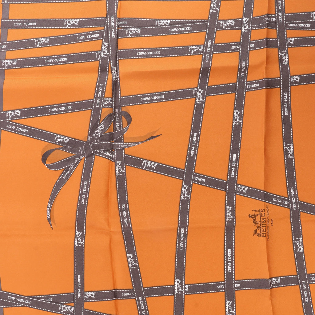 Hermès Carré 90 "Bolduc Ribbon" Silk handkerchief in Orange