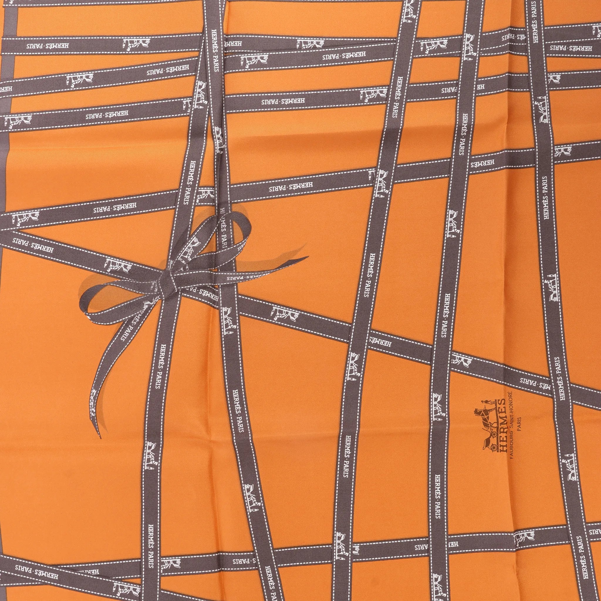 Hermès Carré 90 "Bolduc Ribbon" Silk handkerchief in Orange