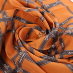 Hermès Carré 90 "Bolduc Ribbon" Silk handkerchief in Orange