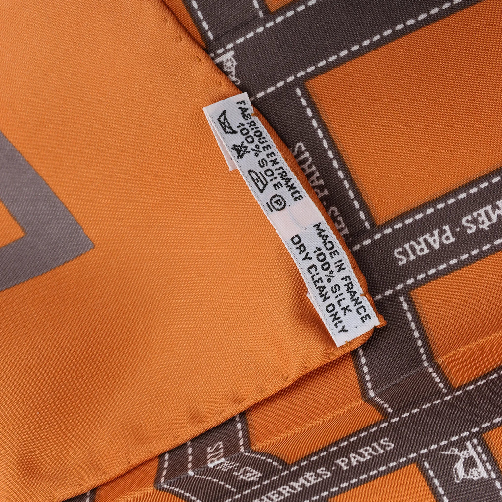 Hermès Carré 90 "Bolduc Ribbon" Silk handkerchief in Orange