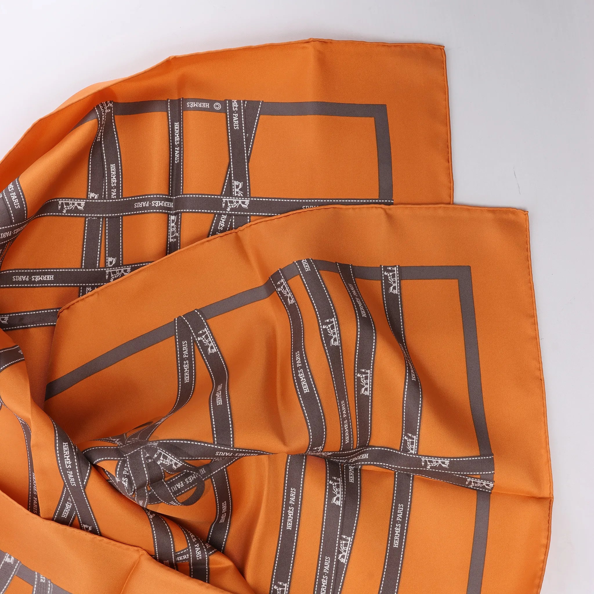Hermès Carré 90 "Bolduc Ribbon" Silk handkerchief in Orange