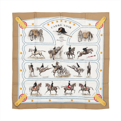 Hermès Carré 90 "CADRE NOIR" silk scarf in beige featuring detailed equestrian illustrations of riders and horses in motion, surrounded by military-inspired trims and blue stitched borders.