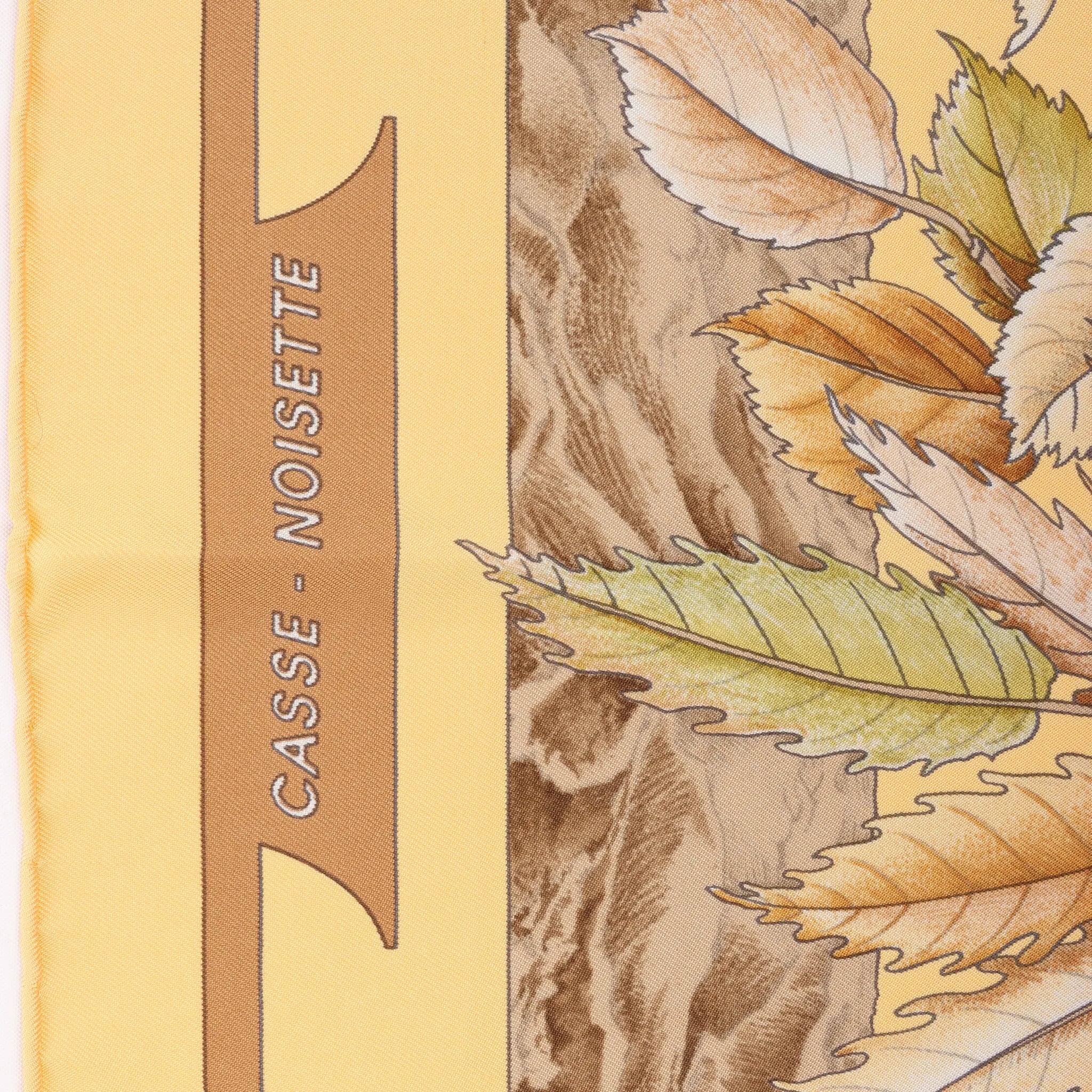 Hermès Carré 90 "CASSE NOISETTE" Silk handkerchief in Yellow x Brown