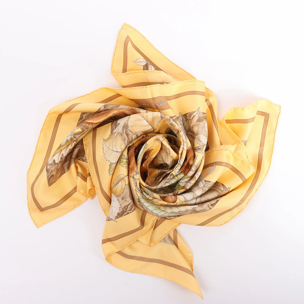 Hermès Carré 90 "CASSE NOISETTE" Silk handkerchief in Yellow x Brown