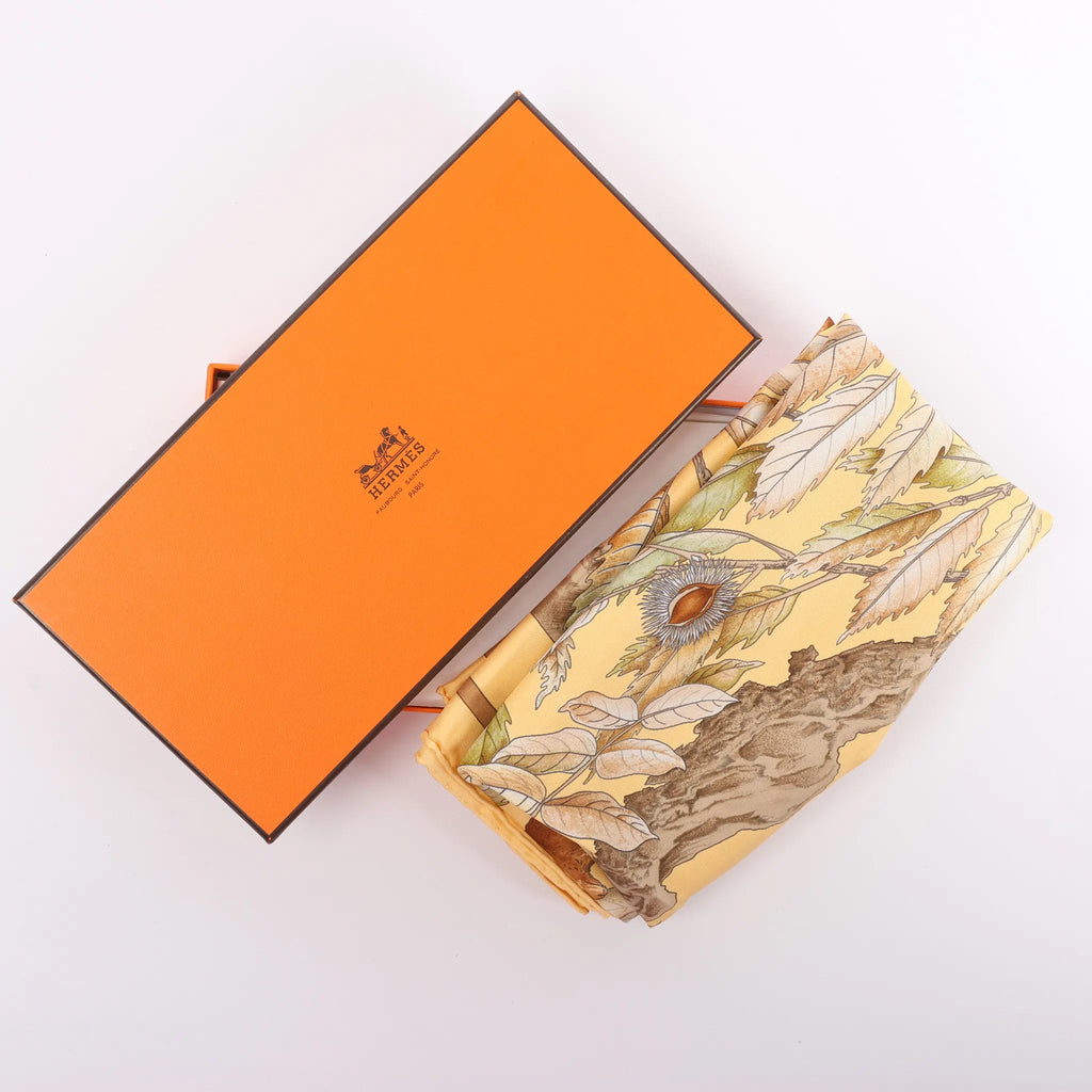 Hermès Carré 90 "CASSE NOISETTE" Silk handkerchief in Yellow x Brown