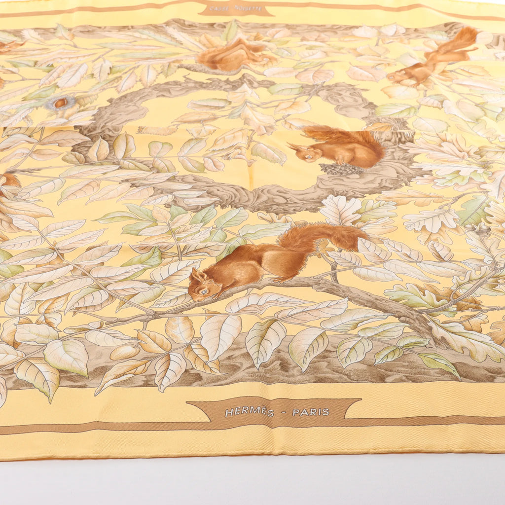 Hermès Carré 90 "CASSE NOISETTE" Silk handkerchief in Yellow x Brown