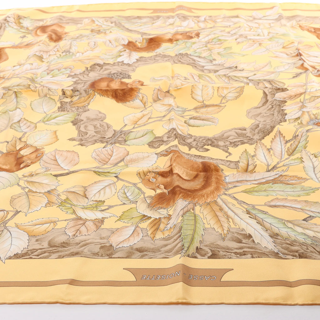 Hermès Carré 90 "CASSE NOISETTE" Silk handkerchief in Yellow x Brown