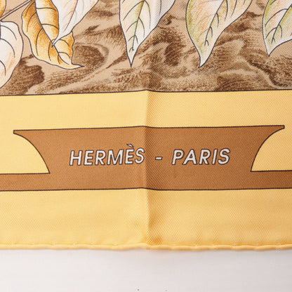Hermès Carré 90 "CASSE NOISETTE" Silk handkerchief in Yellow
