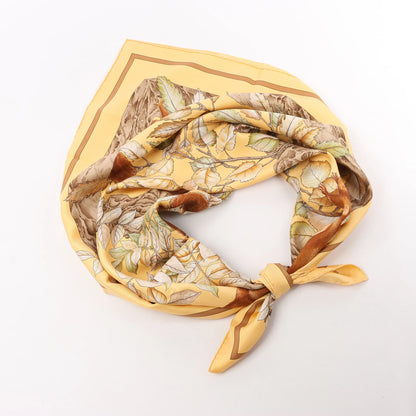 Hermès Carré 90 "CASSE NOISETTE" Silk handkerchief in Yellow