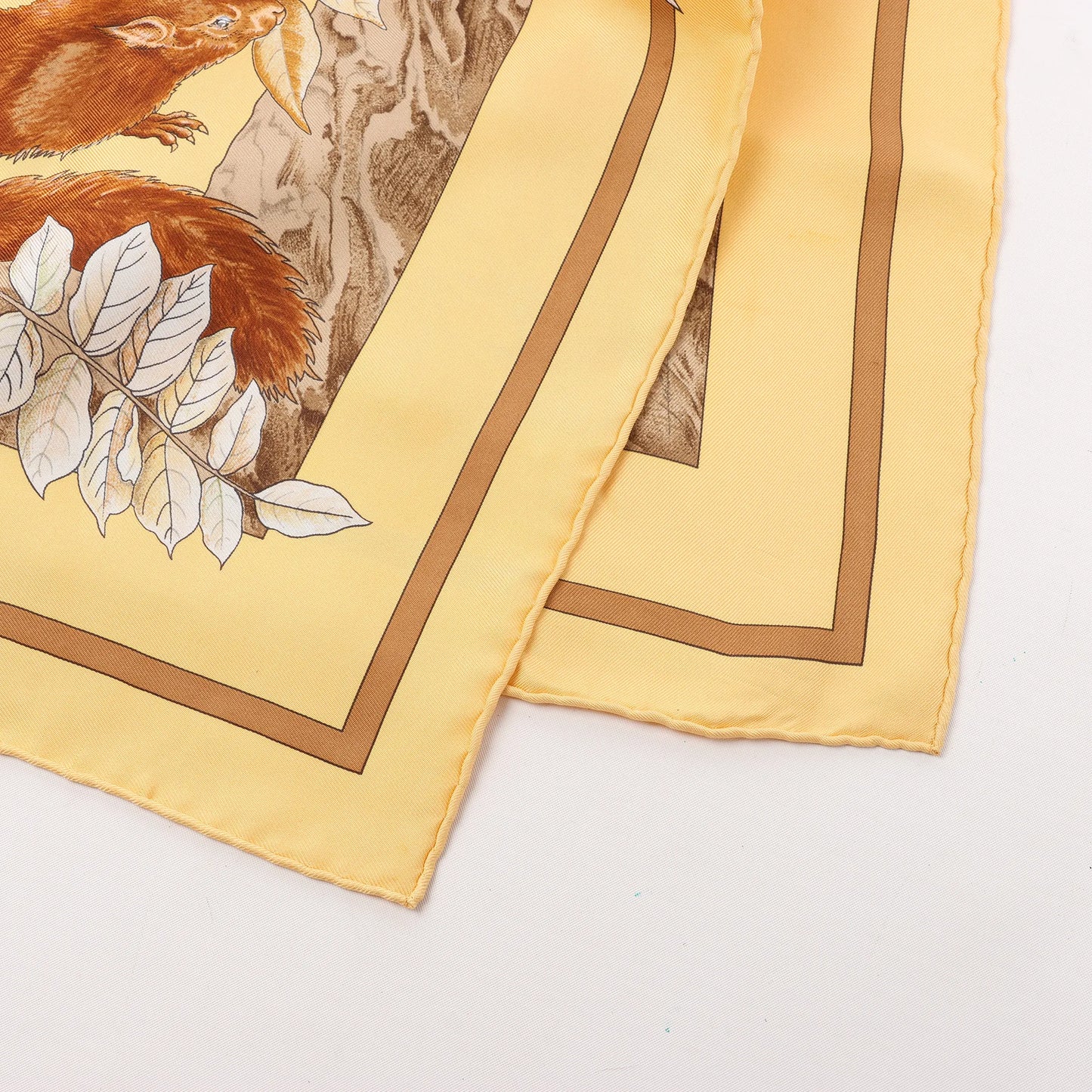 Hermès Carré 90 "CASSE NOISETTE" Silk handkerchief in Yellow