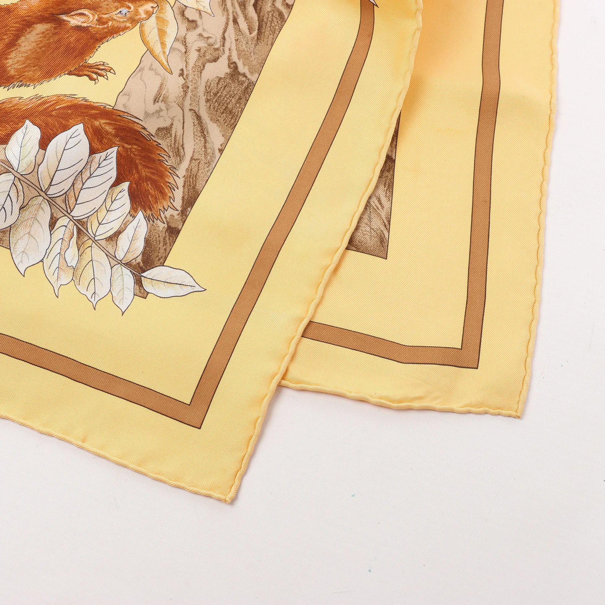 Hermès Carré 90 "CASSE NOISETTE" Silk handkerchief in Yellow