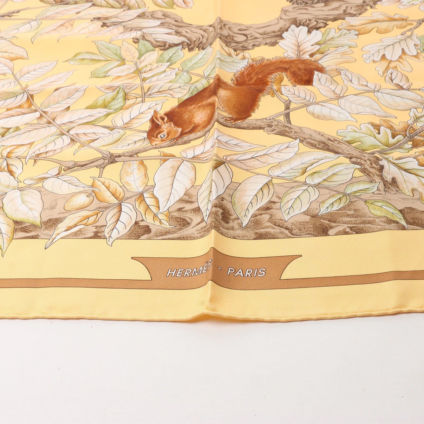 Hermès Carré 90 "CASSE NOISETTE" Silk handkerchief in Yellow