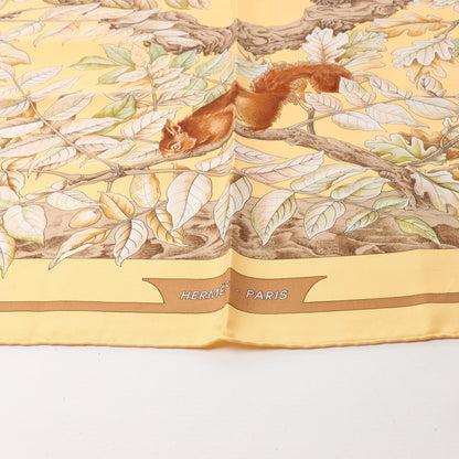 Hermès Carré 90 "CASSE NOISETTE" Silk handkerchief in Yellow