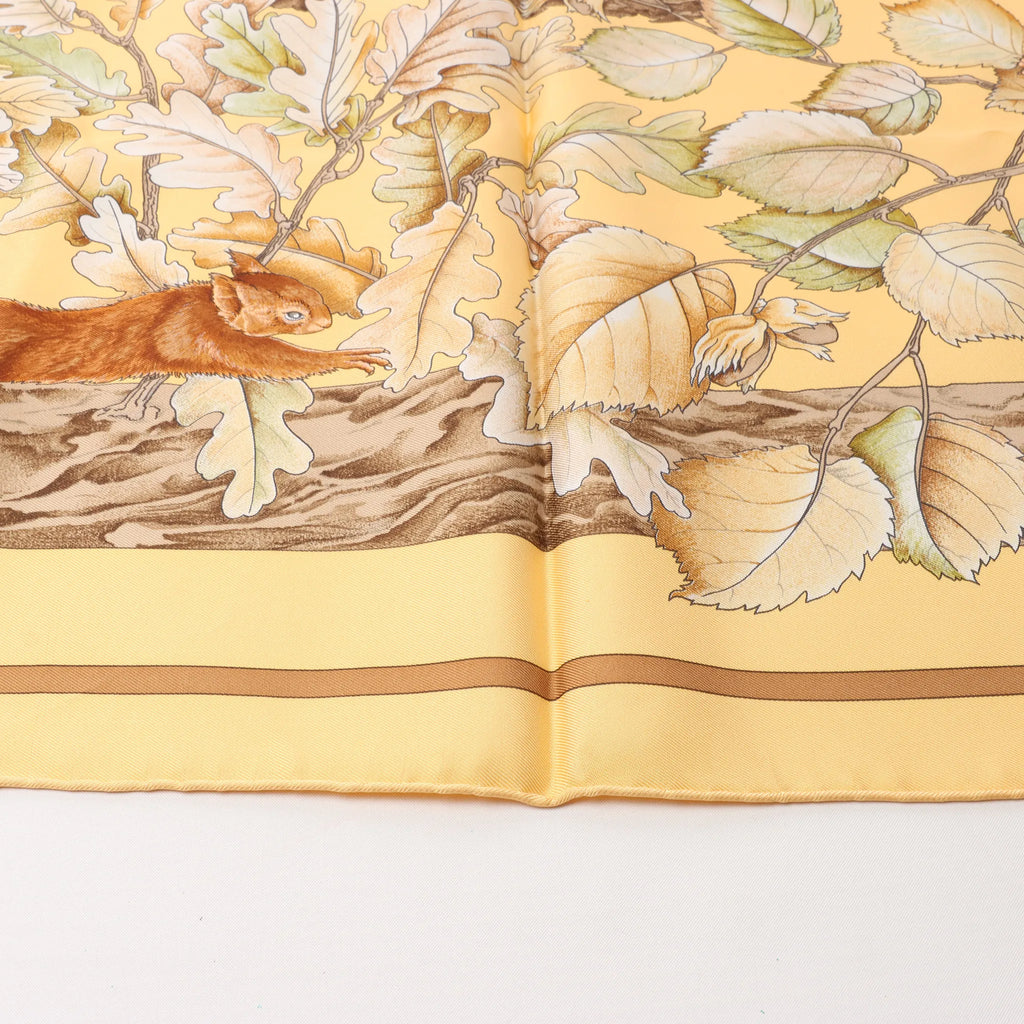 Hermès Carré 90 "CASSE NOISETTE" Silk handkerchief in Yellow