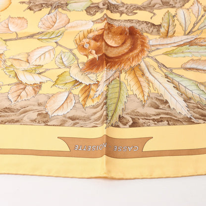 Hermès Carré 90 "CASSE NOISETTE" Silk handkerchief in Yellow