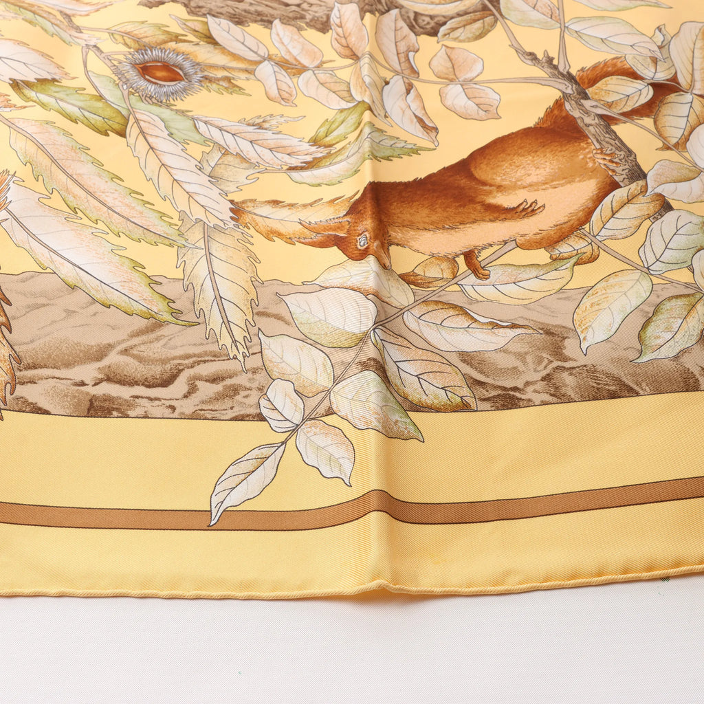 Hermès Carré 90 "CASSE NOISETTE" Silk handkerchief in Yellow