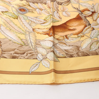 Hermès Carré 90 "CASSE NOISETTE" Silk handkerchief in Yellow