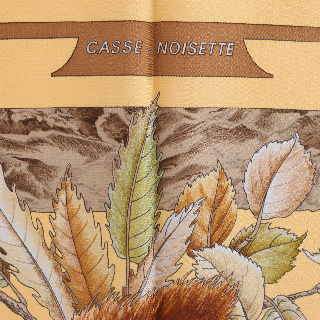 Hermès Carré 90 "CASSE NOISETTE" Silk handkerchief in Yellow