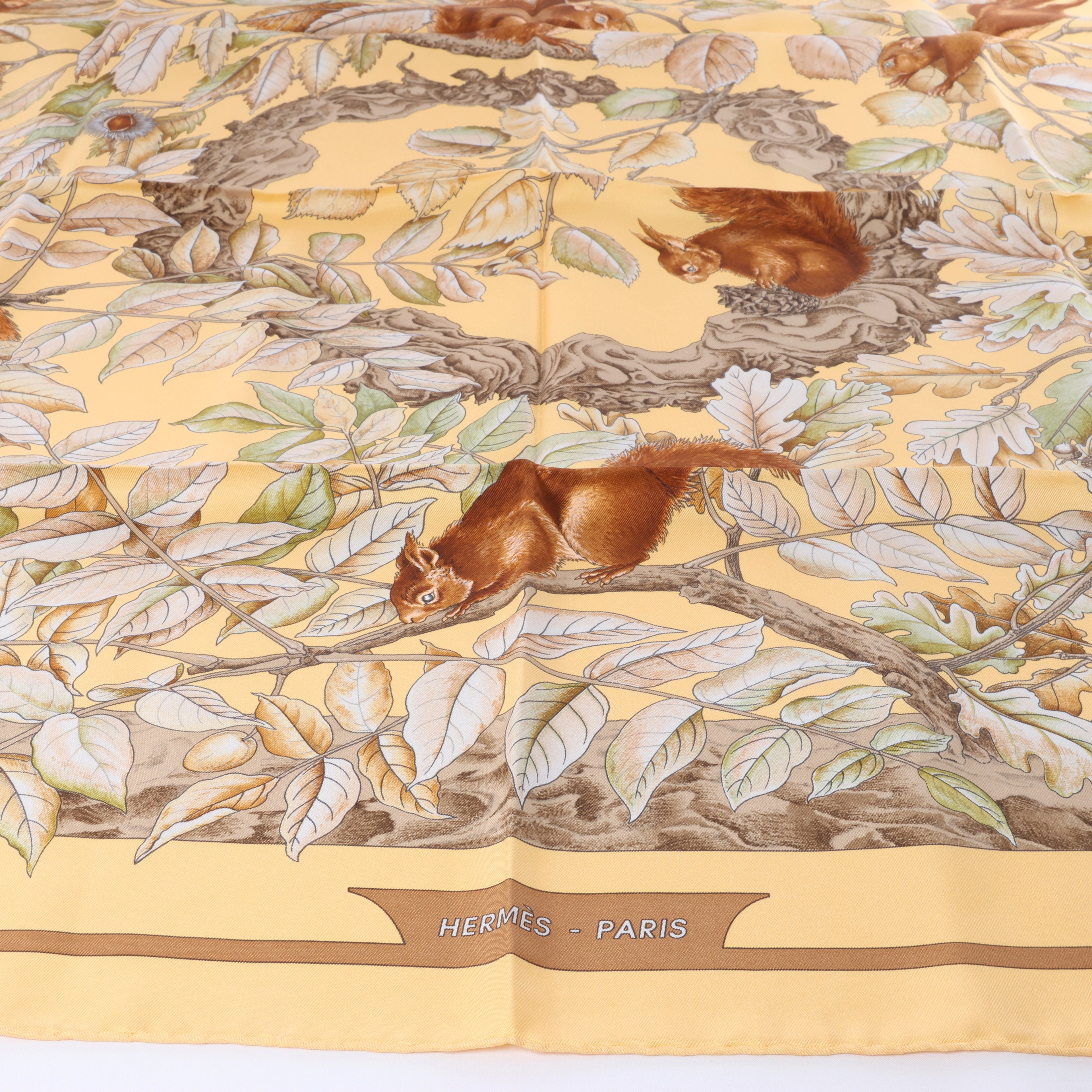 Hermès Carré 90 "CASSE NOISETTE" Silk handkerchief in Yellow