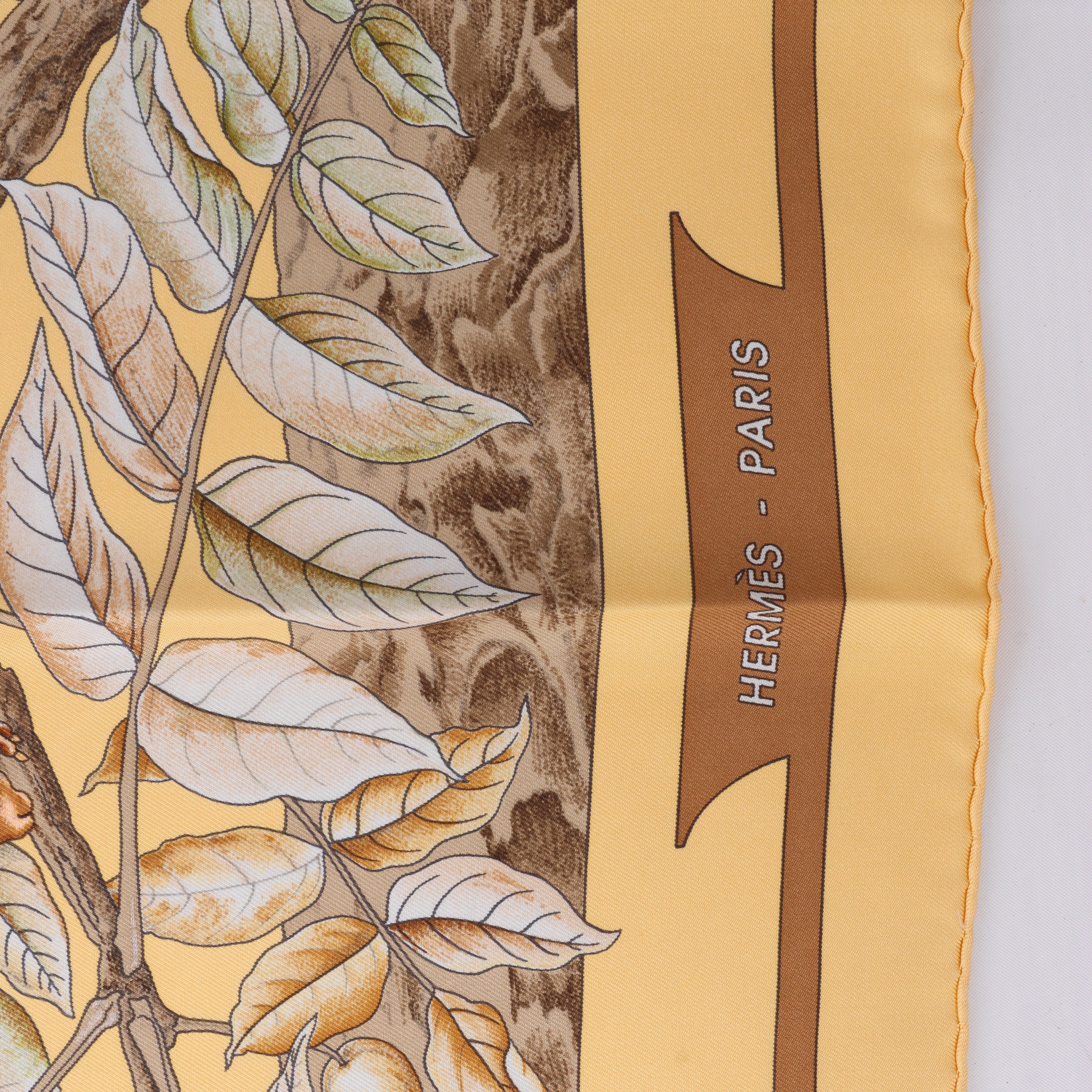 Hermès Carré 90 "CASSE NOISETTE" Silk handkerchief in Yellow