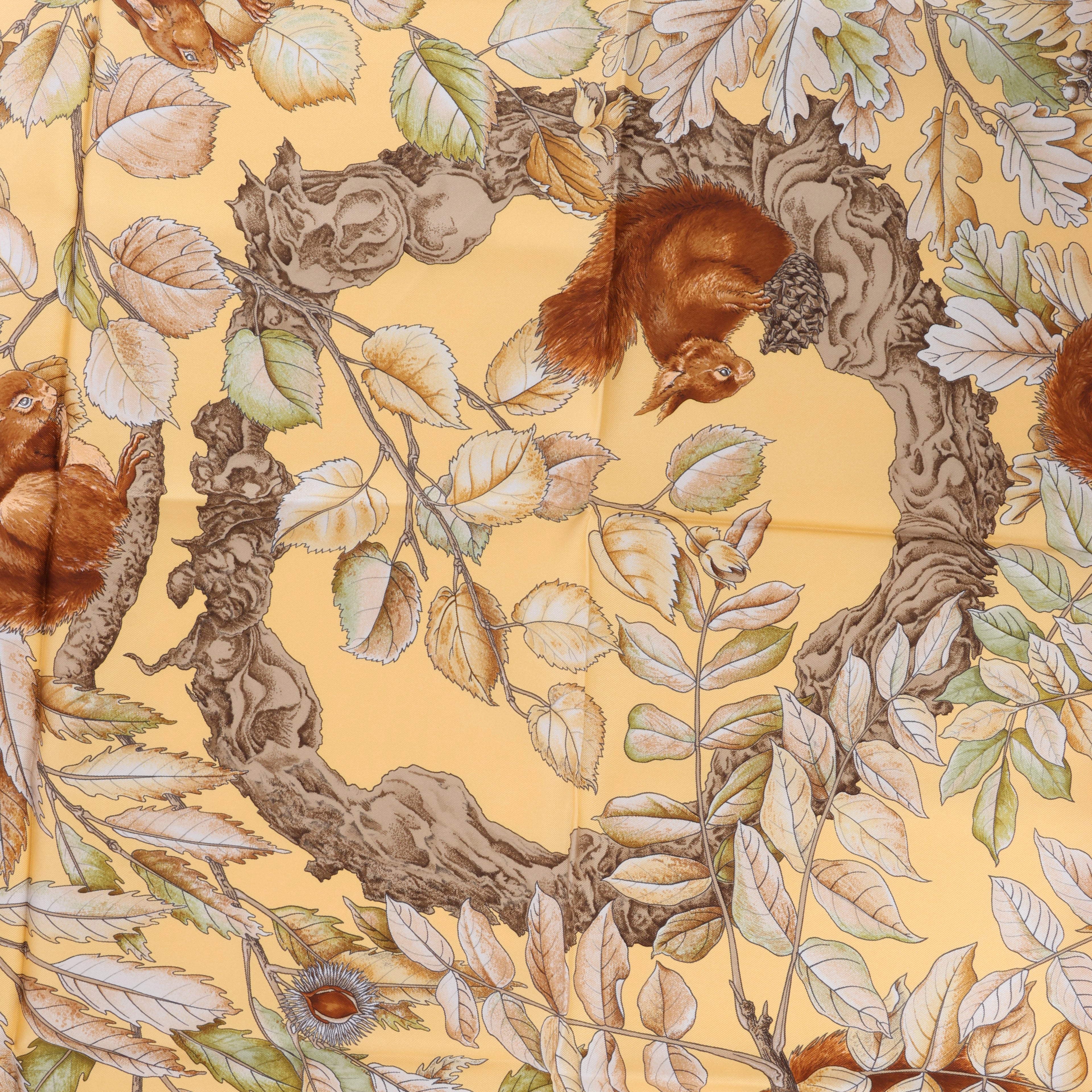 Hermès Carré 90 "CASSE NOISETTE" Silk handkerchief in Yellow