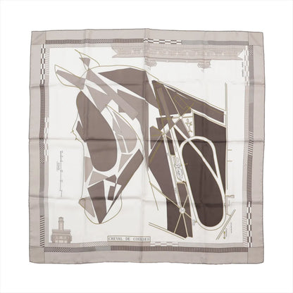 Hermès Carré 90 "CHEVAL DE COURSES" silk scarf in gray and white, featuring an abstract geometric horse head overlaid with racetrack and equestrian-themed map elements, framed by a minimalist border with architectural details.