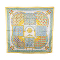 Hermès Carré 90 yellow, pale blue and ivory silk scarf with Byzantine-inspired mosaic panels, arches, birds and ornate geometric borders.