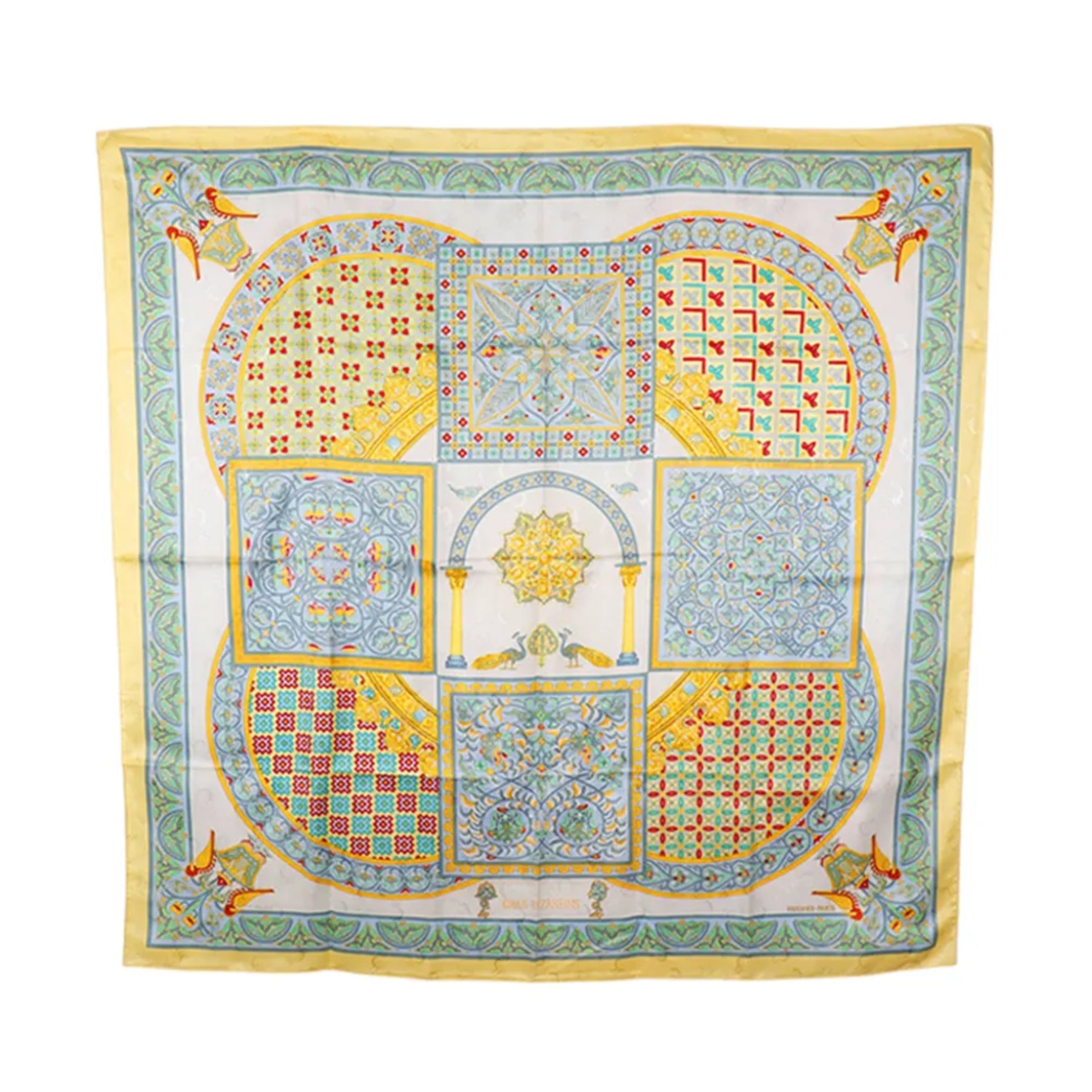 Hermès Carré 90 yellow, pale blue and ivory silk scarf with Byzantine-inspired mosaic panels, arches, birds and ornate geometric borders.