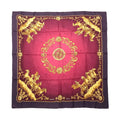 Hermès Carré 90 purple silk scarf with pink center, gold celestial medallion, and gold horse motifs in corners with ornate gold border, laid flat