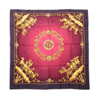 Hermès Carré 90 purple silk scarf with pink center, gold celestial medallion, and gold horse motifs in corners with ornate gold border, laid flat